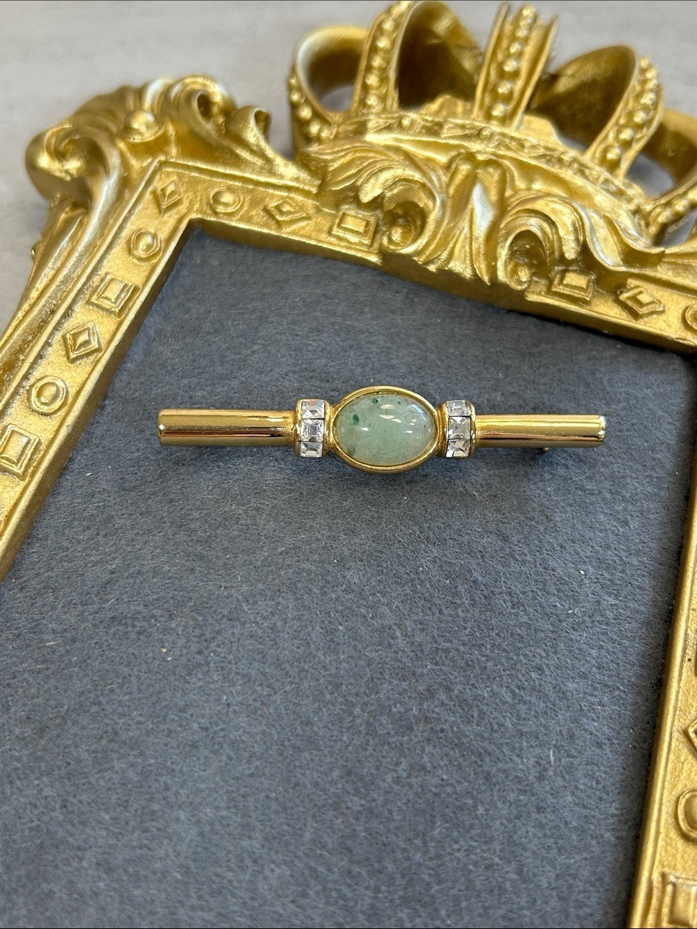 Gold-Tone Bar Brooch with Green Stone Cabochon and Clear Accents